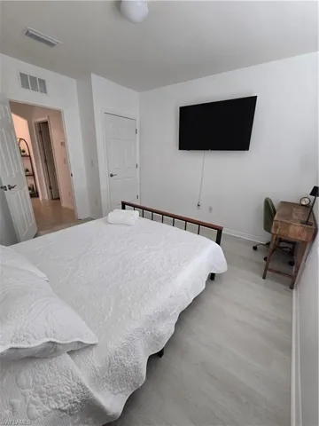 Bedroom with light wood-type flooring