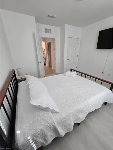 Bedroom with light wood-type flooring