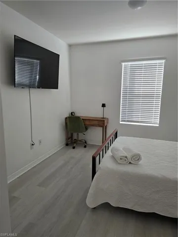 Bedroom featuring hardwood / wood-style floors