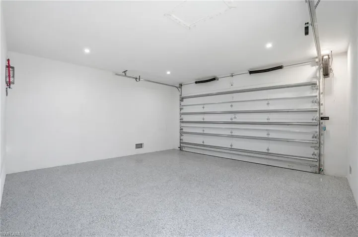 2-car garage featuring epoxy flooring
