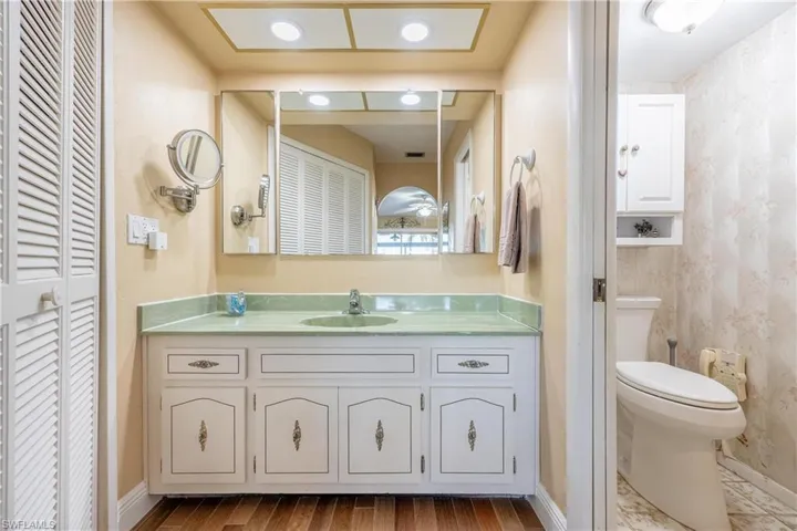 To left walk in cedar lined closet