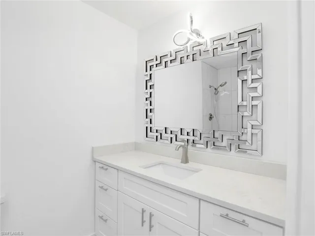 Bathroom with vanity and walk in shower
