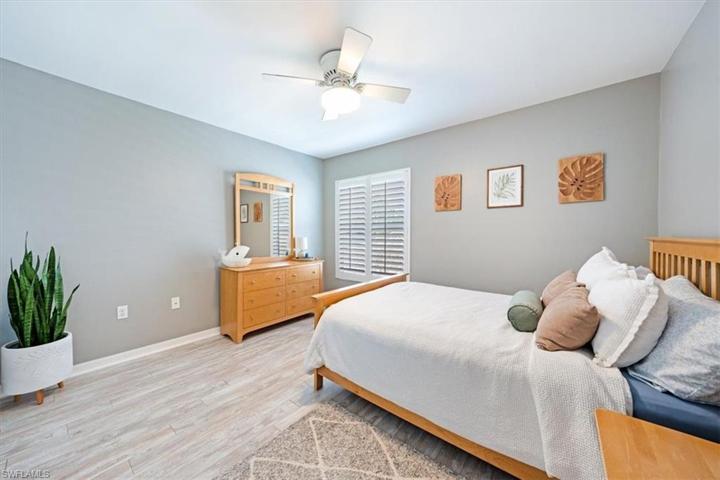 The upstairs bedroom and bath offer a spacious second floor retreat.