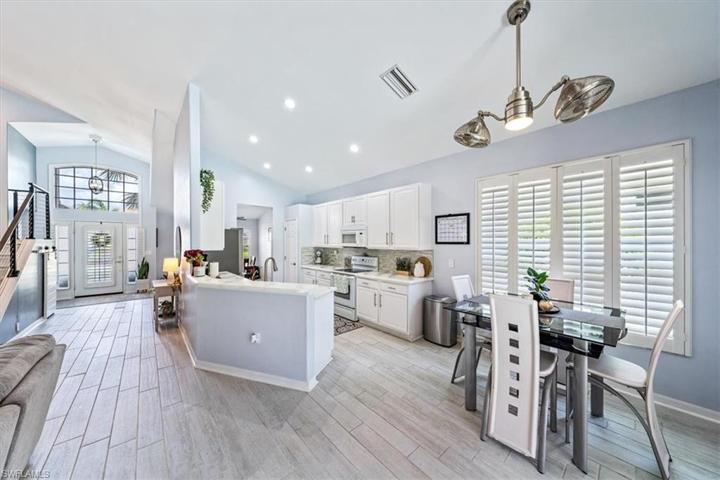 The kitchen and breakfast nook open up to the great room.