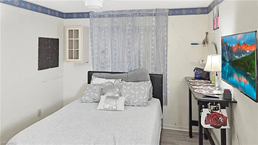 Bedroom featuring hardwood / wood-style floors