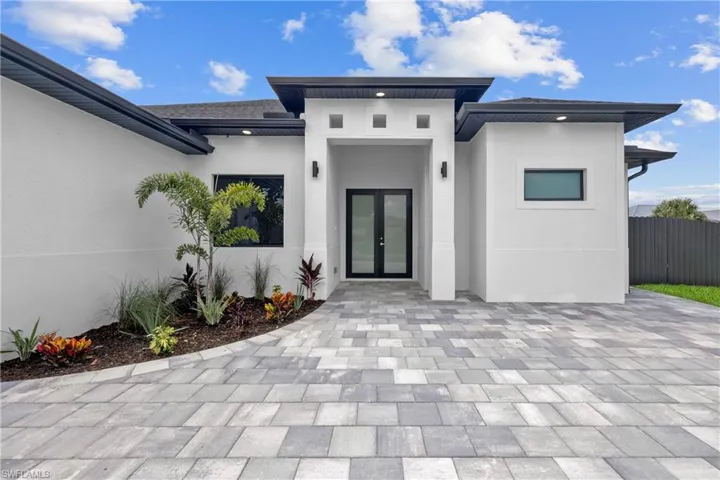 View of front of house featuring french doors