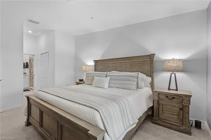 Master bedroom with walk-in closets and ensuite bathroom