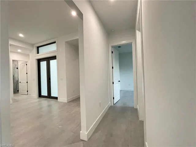 Hallway with french doors