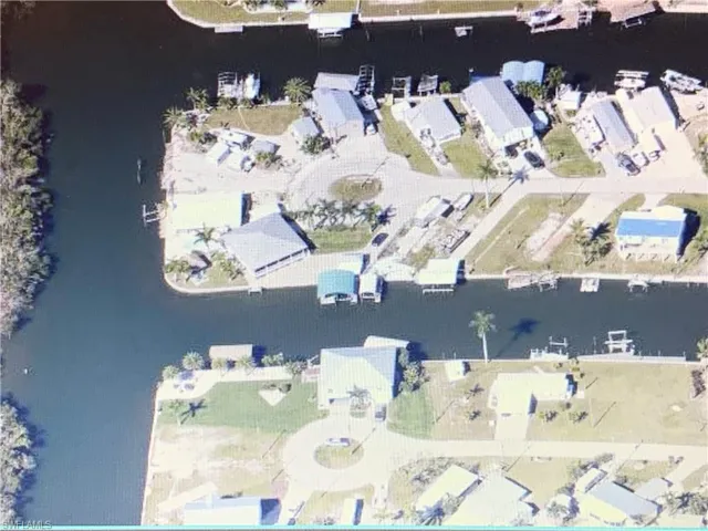 Birds eye view of property featuring mangrove views and easy exit access.