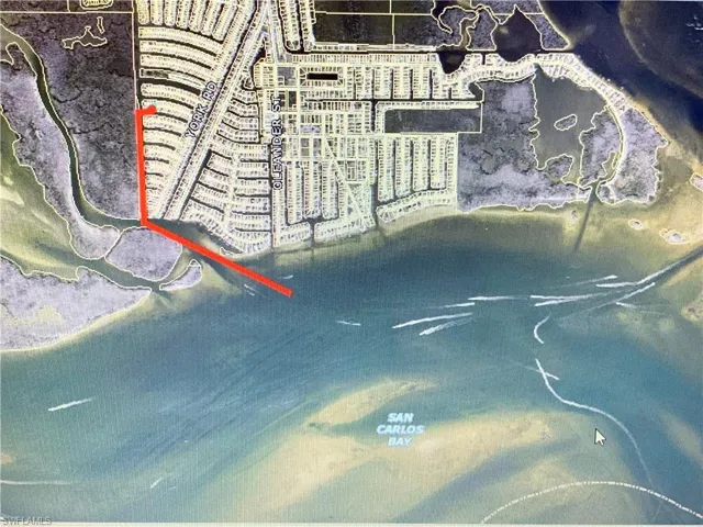 Aerial view showing direct gulf access for boating.