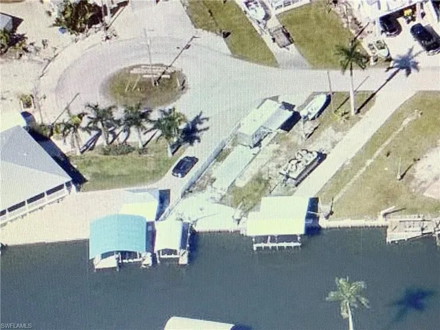 Bird's eye view of lot showing covered boat lift.