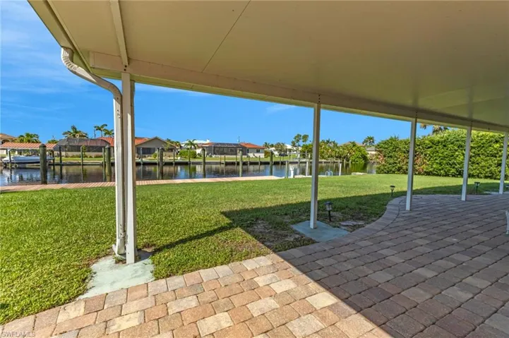 View of patio / terrace featuring a water view and a residential view