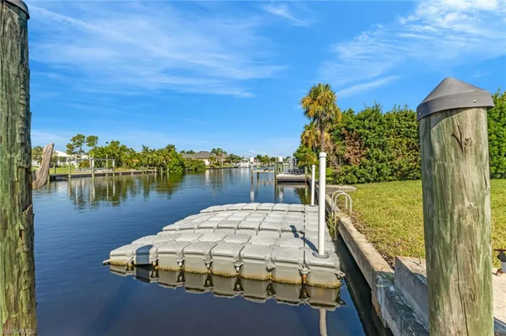 Dock featuring a water view