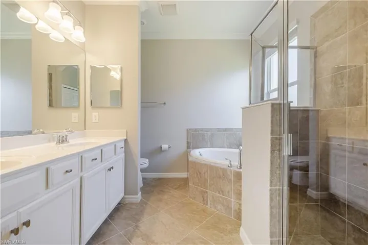 Dual Sinks - large tub and spacious walk-in shower