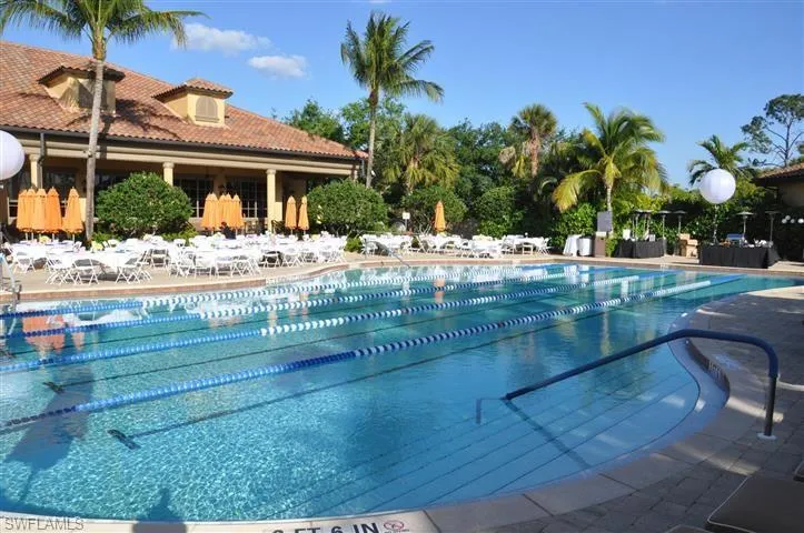 View of swimming pool featuring a patio