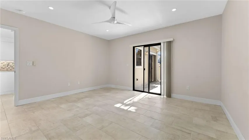 Unfurnished room with ceiling fan