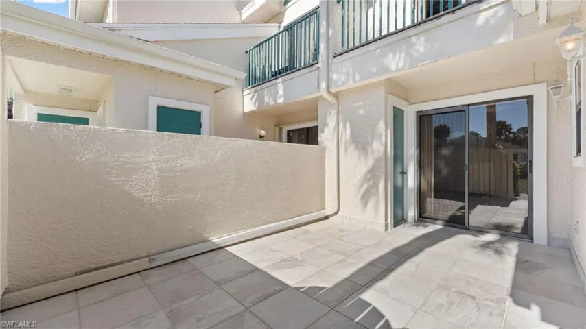 View of patio / terrace with a balcony