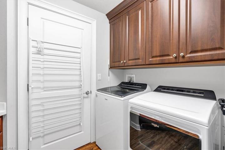 Lots of storage with laundry sink.