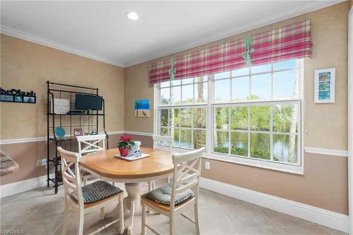 Tiled dining area with ornamental molding