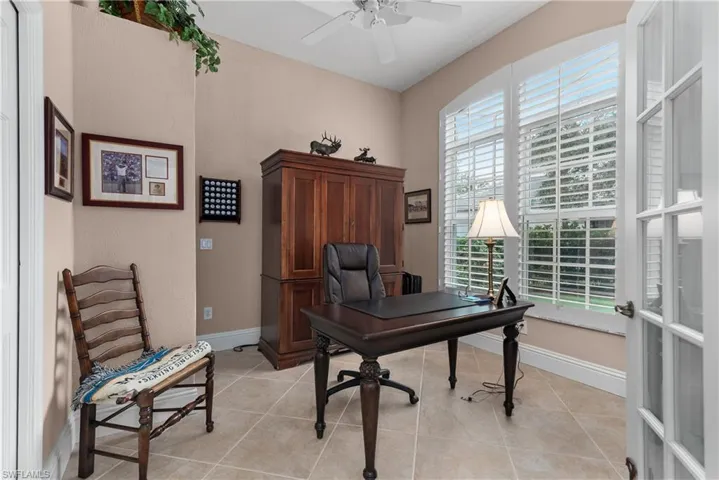 Tiled office with ceiling fan