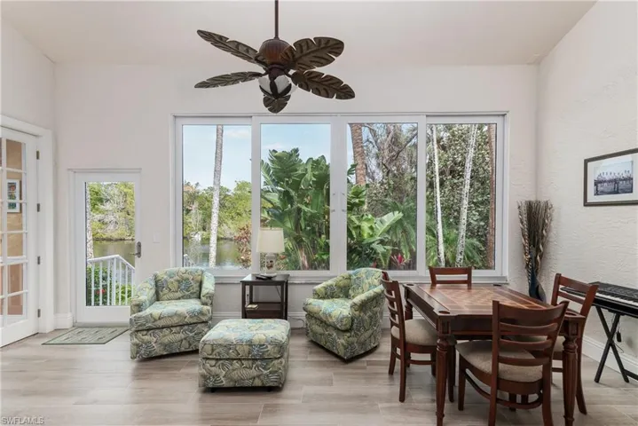 Sunroom / solarium featuring ceiling fan and plenty of natural light