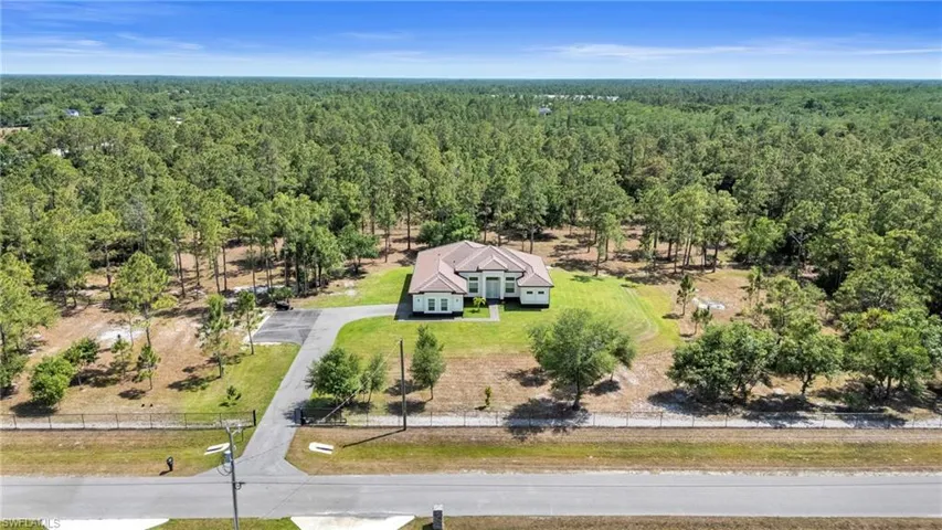 Further away bird's eye (partial) view of property with a forest view!
