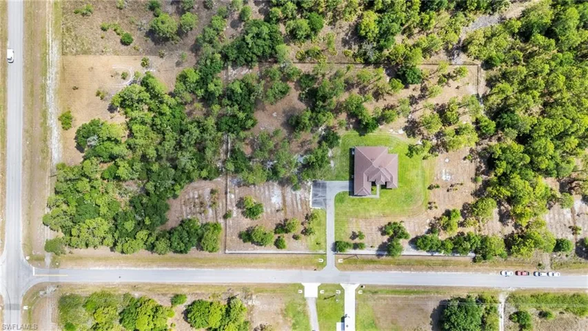 Bird's eye view of this corner 5.15-acre lot!