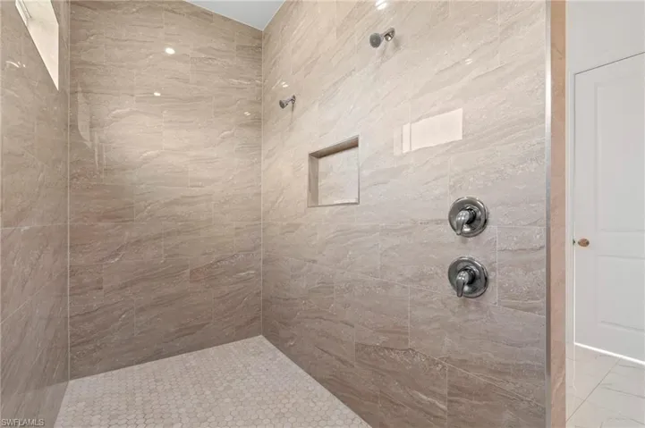 X-large walk-in shower with double showwr heads!