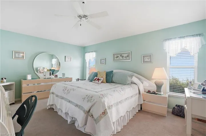Bedroom featuring carpet floors and ceiling fan