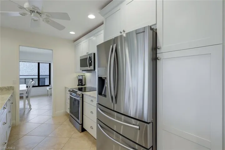 Ample Shaker Style Cabinetry, Plus Extra Full Hall Pantry w/ SS Pull Out Shelves