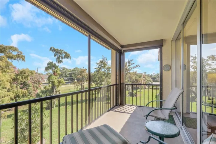 Sunroom featuring a balcony