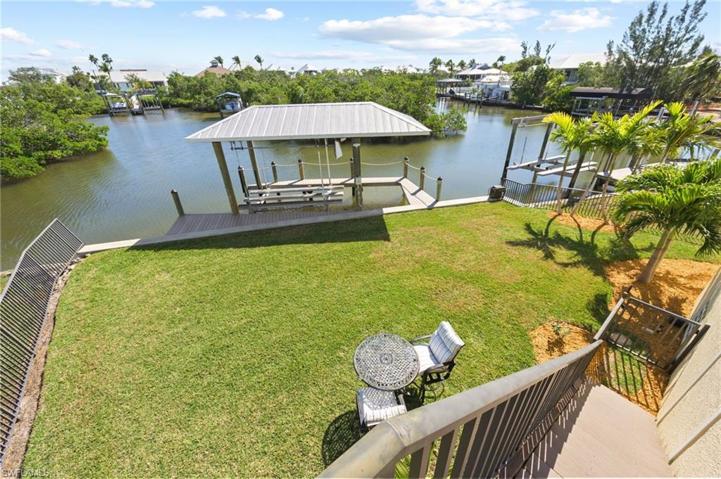 Stairs leading to Back yard and Boat Dock