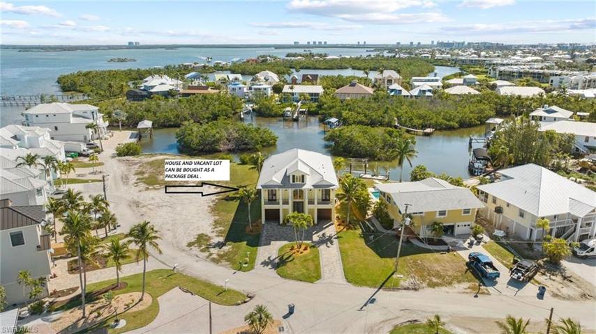 Vacant lot next door is a separate listing and can be bought together