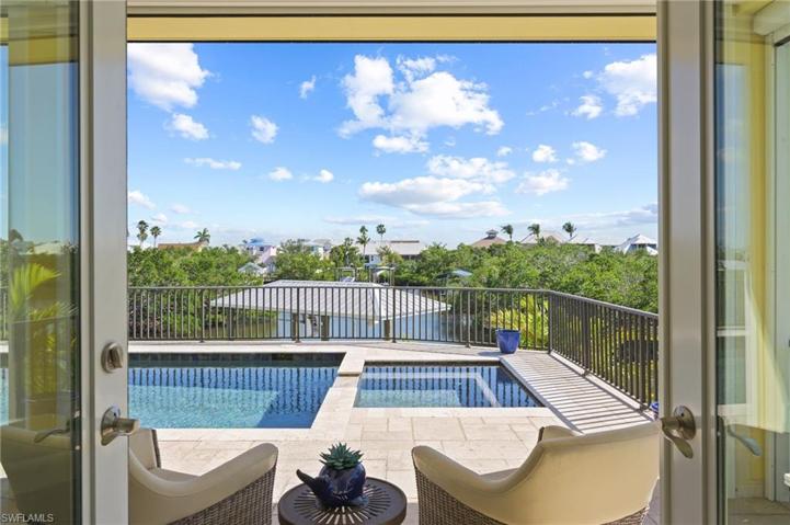 Master bedroom entrance to the pool and lanai