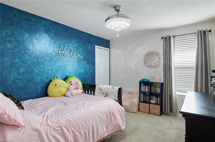 Bedroom with carpet