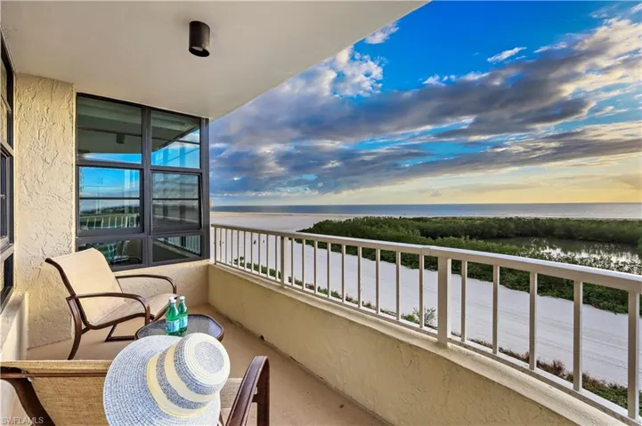 Balcony at dusk with a water view