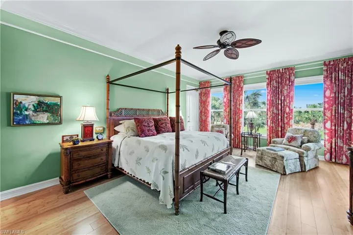 Bedroom with light wood-type flooring and ceiling fan