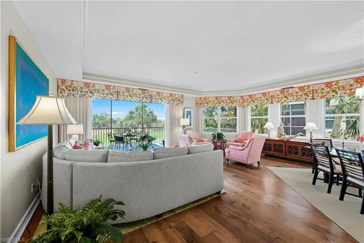 Living room with plenty of natural light and wood-type flooring