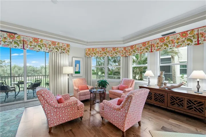 Sunroom with a tray ceiling