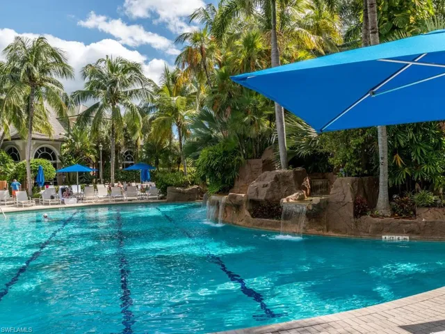 View of swimming pool featuring pool water feature