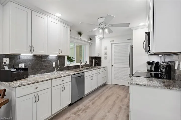 The kitchen’s open-concept layout allows you to stay connected with guests or family while you cook.