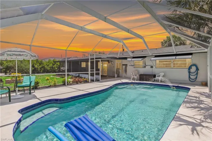 Unwind poolside while watching the sunset paint the sky over your private tropical paradise.