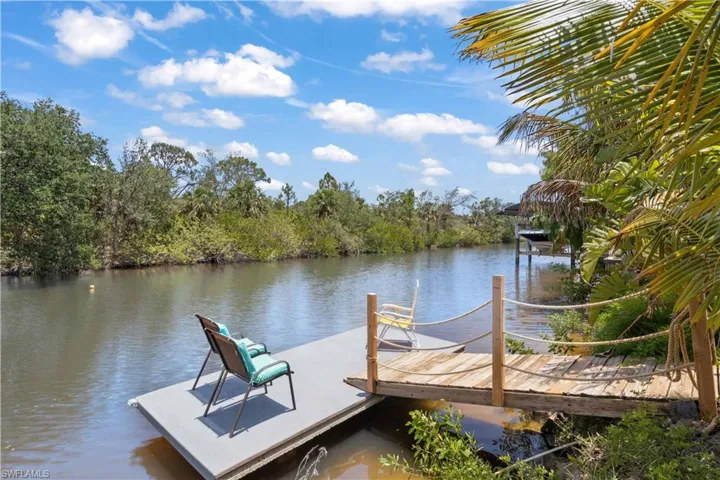 Tropical retreat with character, charm, and your own backyard dock!