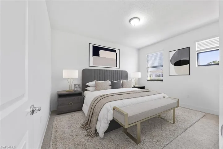 Virtually Staged-Carpeted bedroom featuring baseboards and a textured ceiling