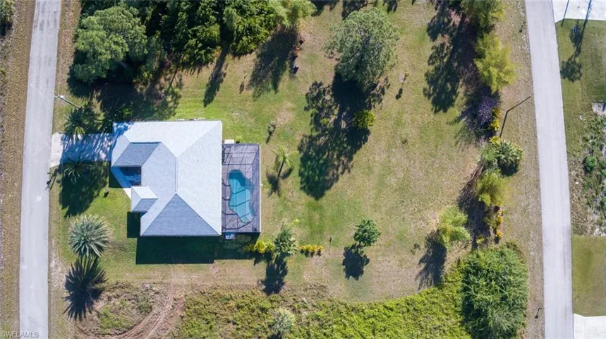 All this land, a pool, and TURNKEY!