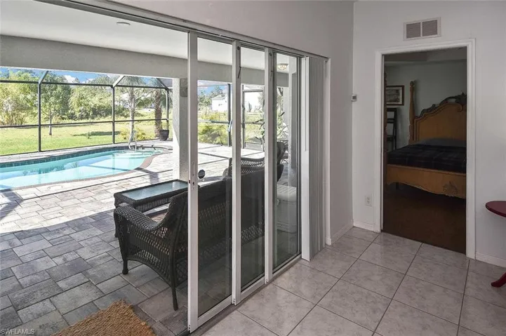 Step through the triple sliders onto the large lanai...