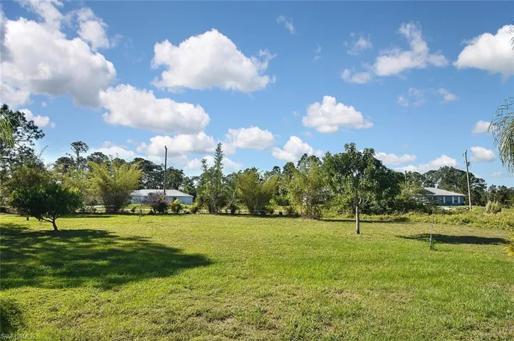 ...while enjoying the view of the extra-large and sunny backyard.