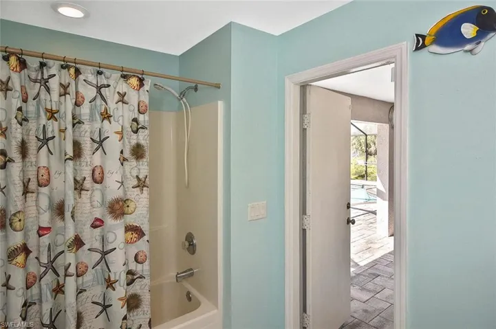 ...and a door leading out to the lanai and pool!