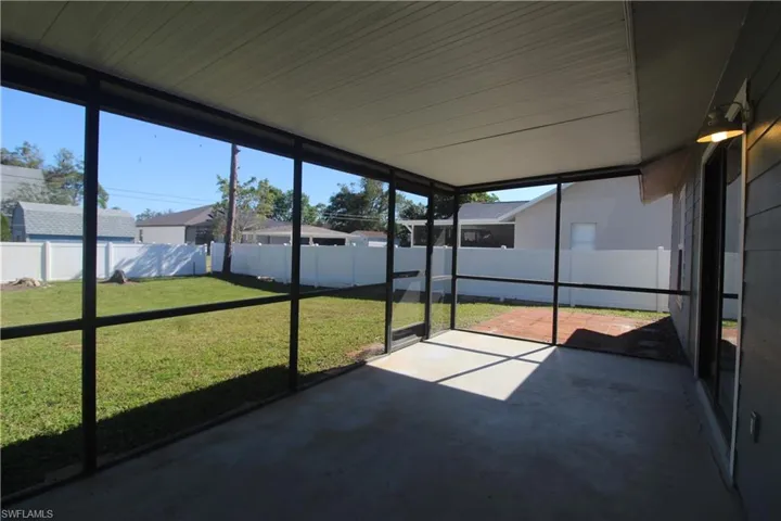 Unfurnished sunroom featuring plenty of natural light