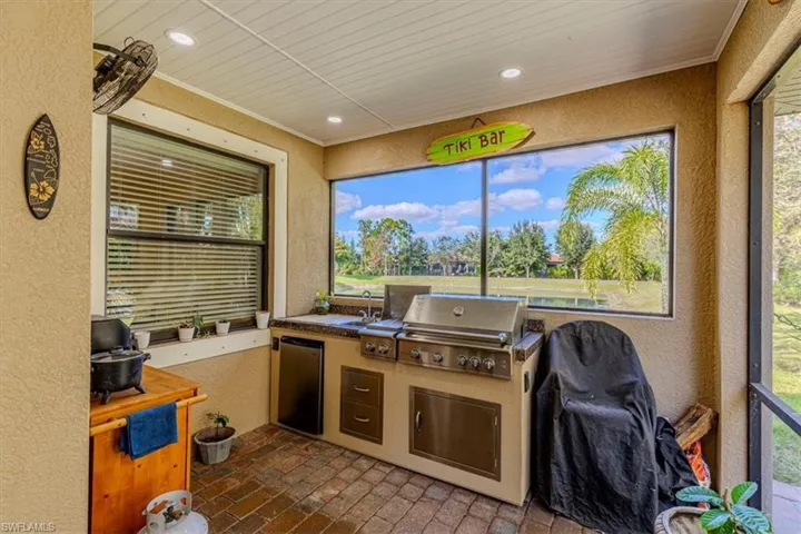 Sunroom featuring healthy amount of natural light